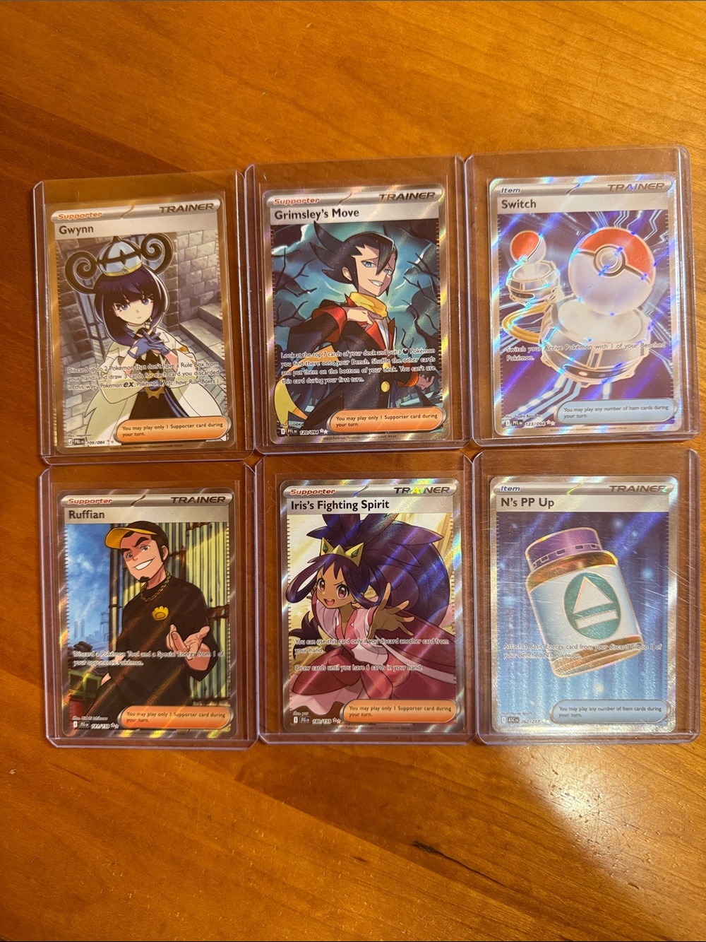 Pokemon Holo Trainer Card Lot — Multicolor (Blue, Purple, Gold, White)